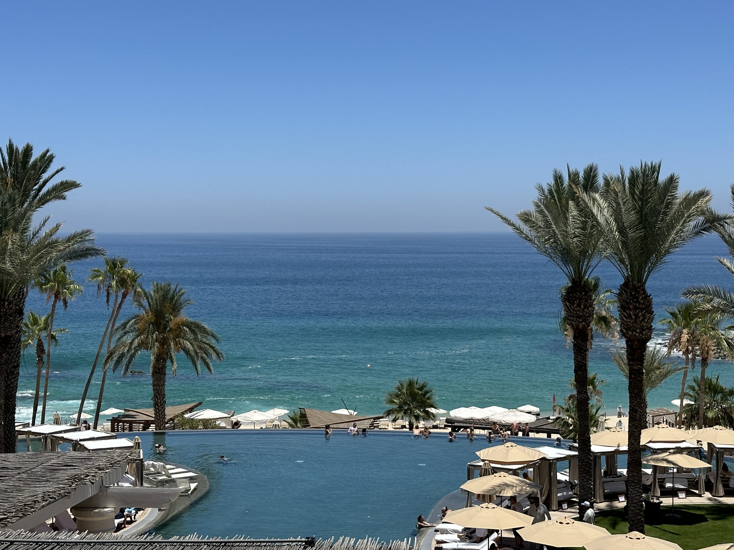 pool and beach scene to rest and relax this summer