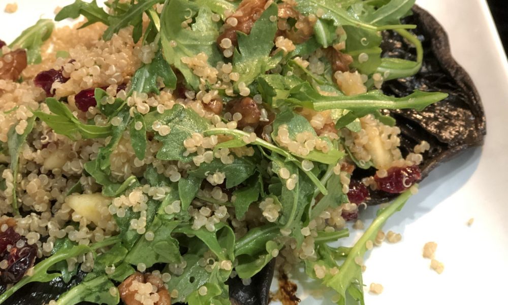 quinoa harvest salad in a portobella mushroom