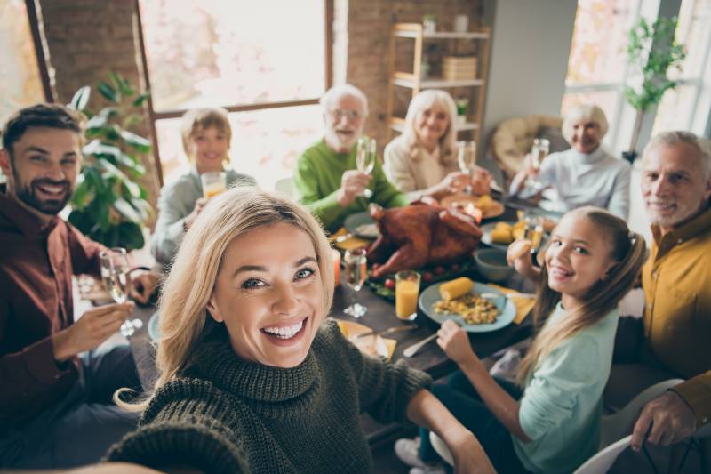 holiday table with family - get your free holiday menu ebook