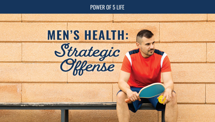 man on a bench holding a pickle ball paddle for a blog post about men's health for men's health month and the strategic offense needed