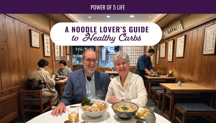 a photo of Dr. B and Melissa traveling in Asia having noodles -- for a blog post about noodles and carbs