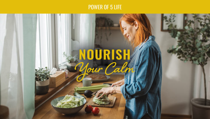 woman prepping food in her kitchen - image for nourish your calm blog post for stress awareness month - eat to reduce stress
