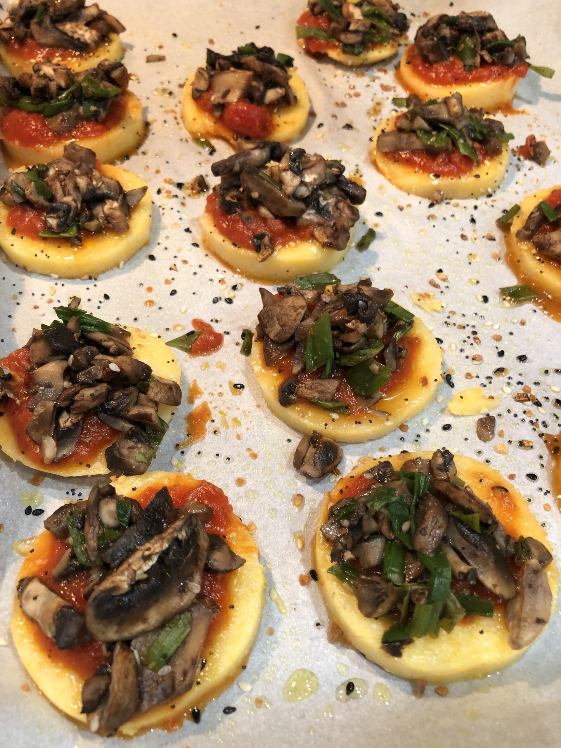 roasted polenta topped with mushrooms and scallions